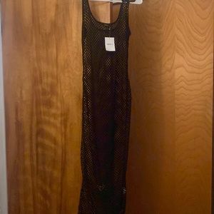 Black netted dress can be worn as a coverup or perfect for a festival!